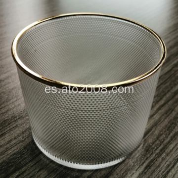 Vaso de vidrio transparente en relieve con borde dorado